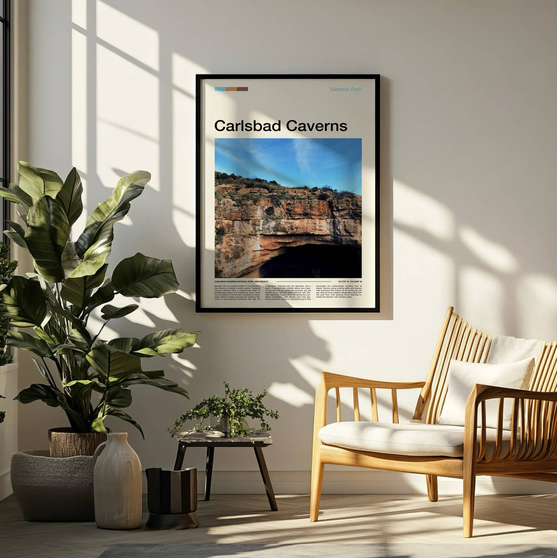 Carlsbad Caverns Cave Entrance Travel Print framed on a pale wall beside houseplants