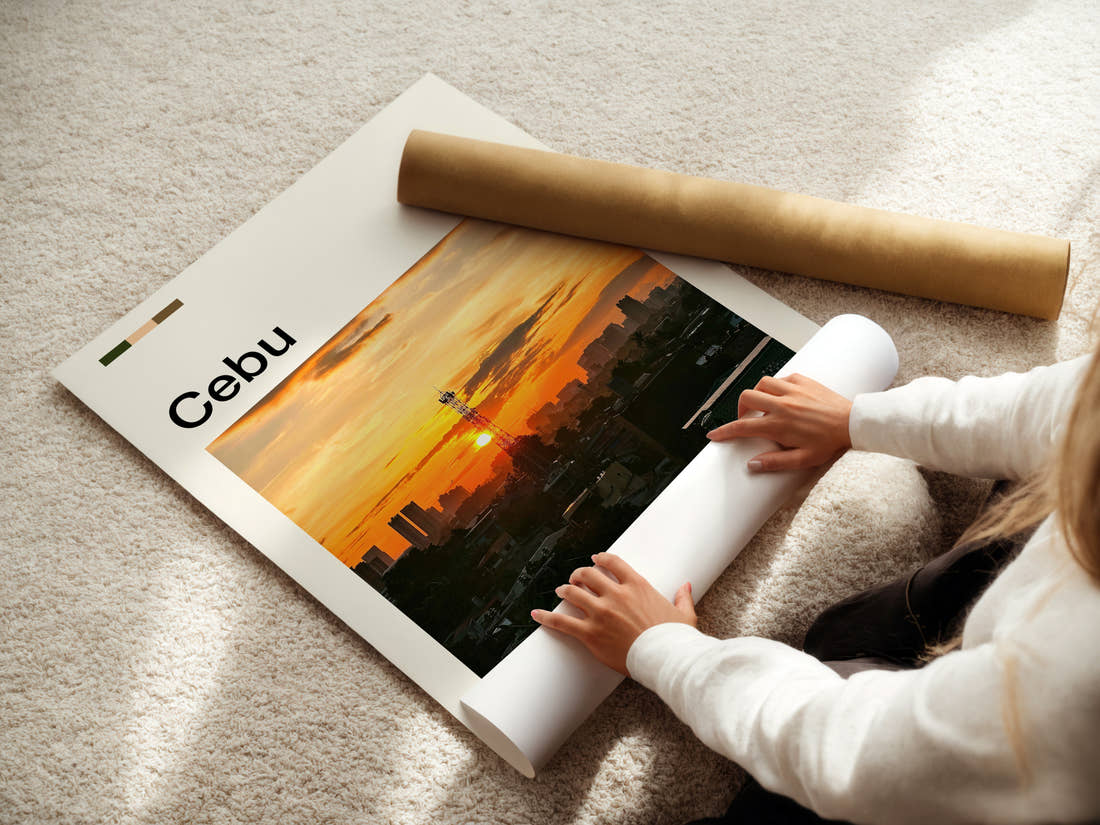 Cebu Sunset City Skyline Travel Print being unrolled from its postal tube