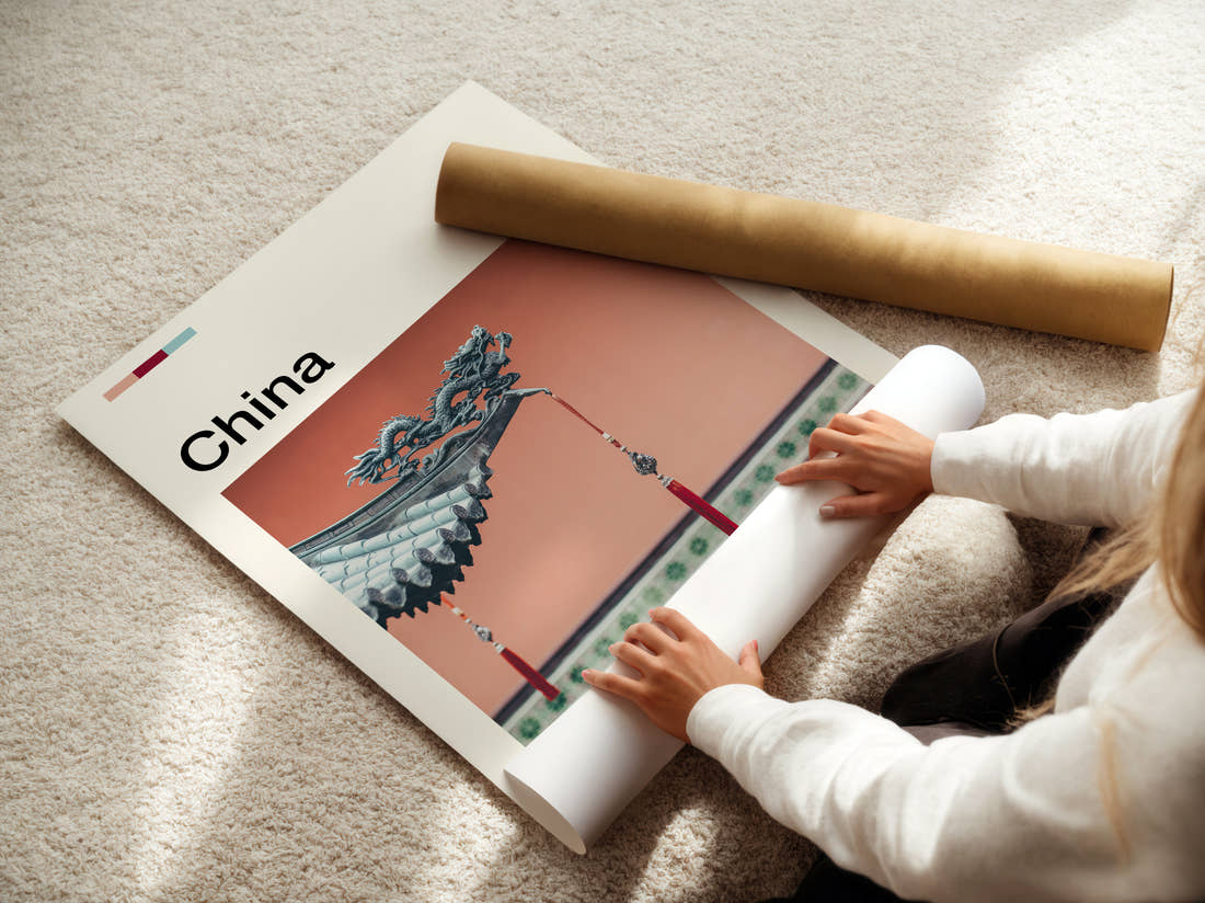China Dragon Roof Detail Travel Print being unrolled from its postal tube