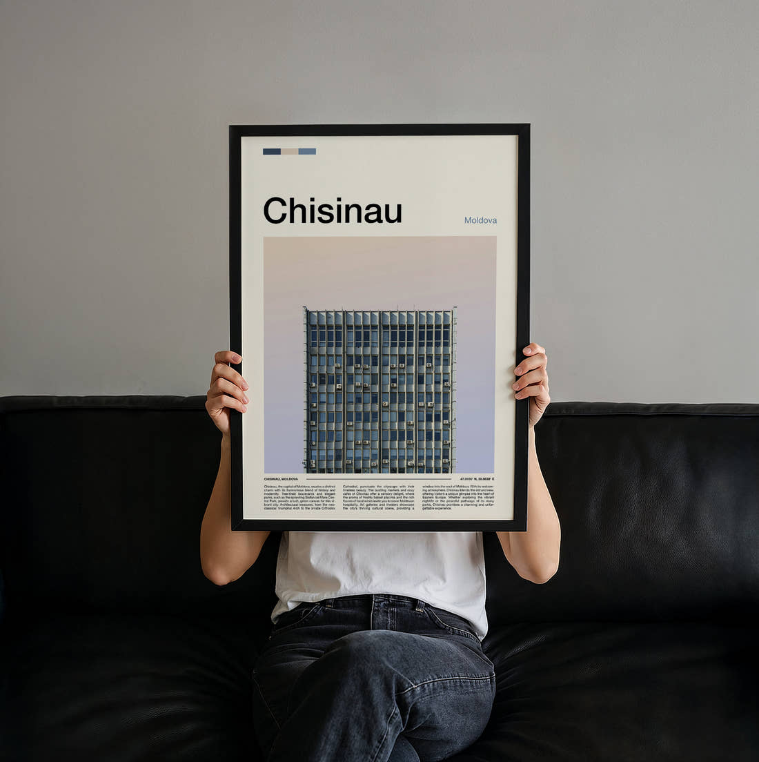 Chisinau Modernist Building Facade Travel Print held up by hand to show the size of the print