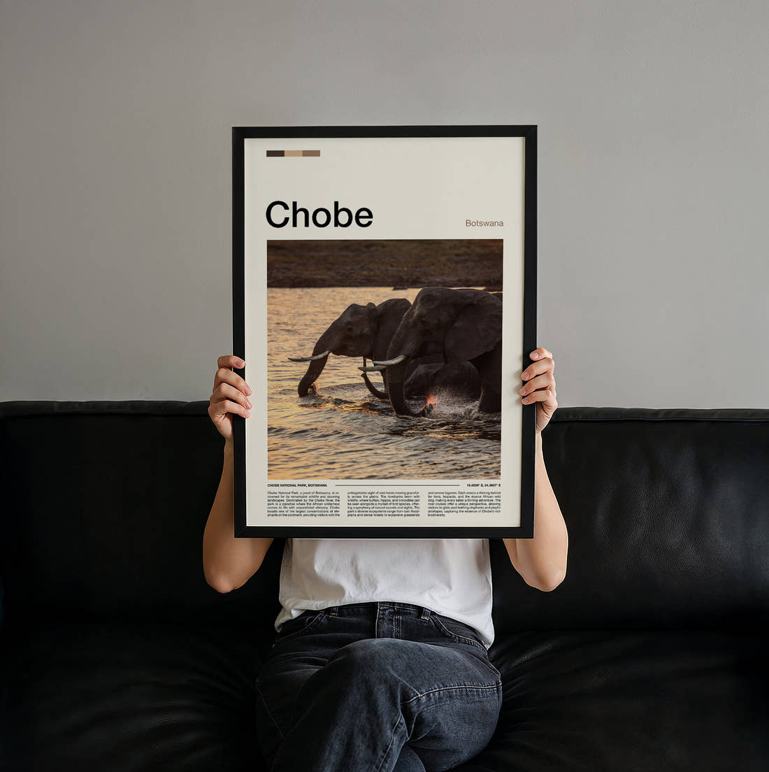 Chobe Elephant In The River Travel Print held up by hand to show the size of the print
