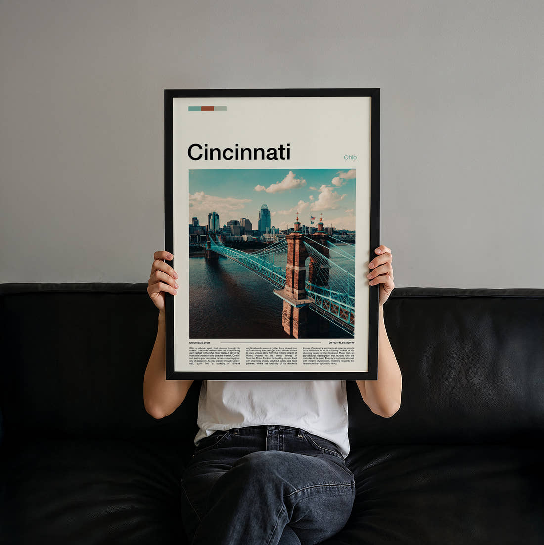 Cincinnati Roebling Suspension Bridge And Skyline Travel Print held up by hand to show the size of the print