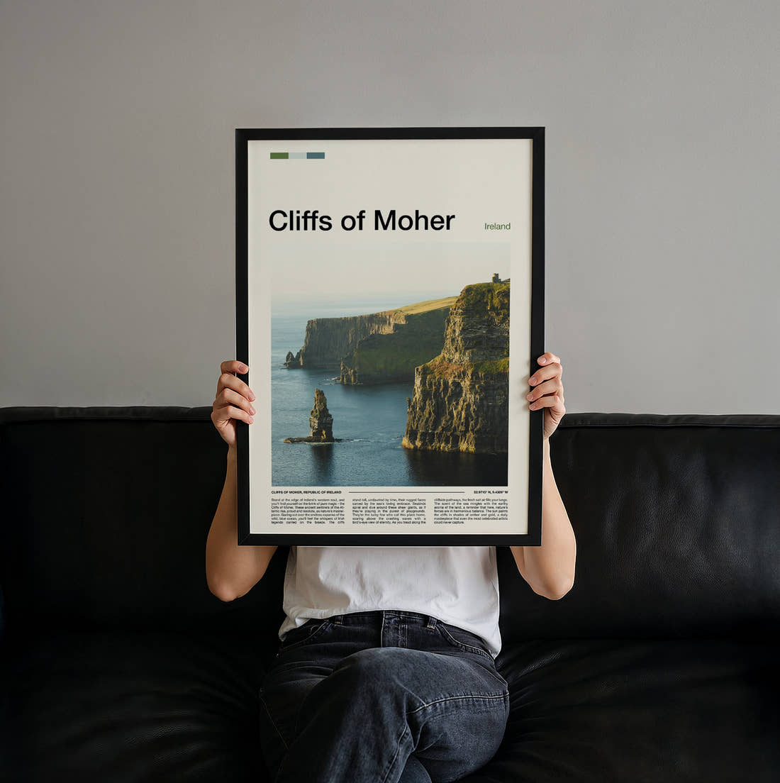 Cliffs Of Moher Sea Stack Below The Cliffs Travel Print held up by hand to show the size of the print