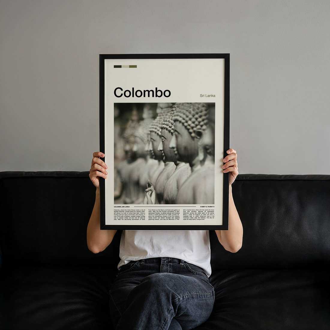 Colombo Rows Of Buddha Statues Travel Print held up by hand to show the size of the print