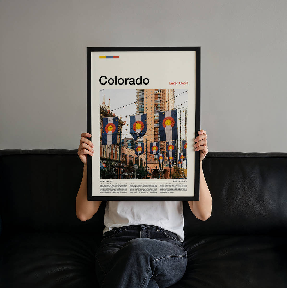 Colorado Flag Banners Over The Street Travel Print held up by hand to show the size of the print
