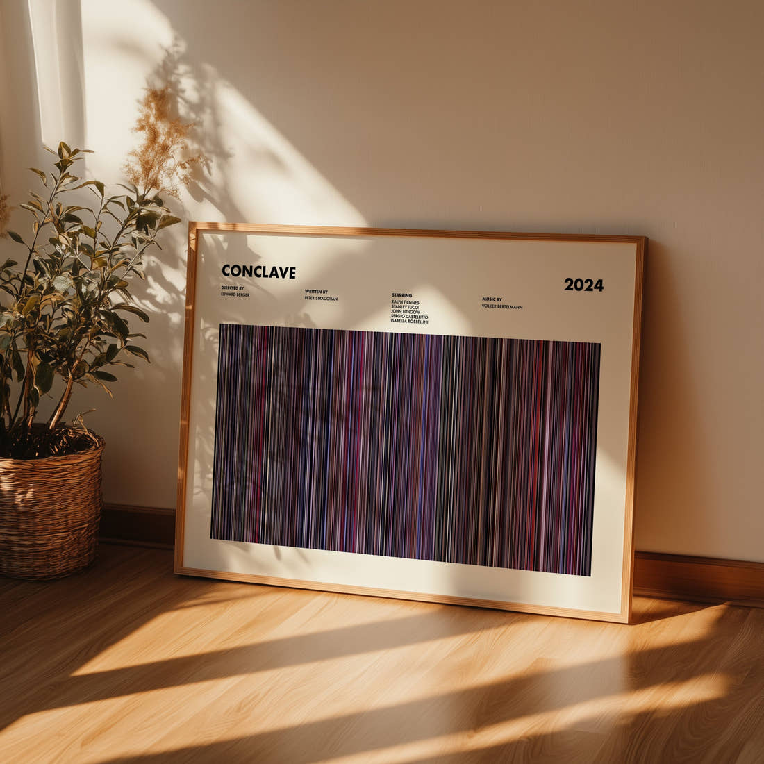 Conclave Movie Barcode Poster framed and leaning against a wall on a wooden floor