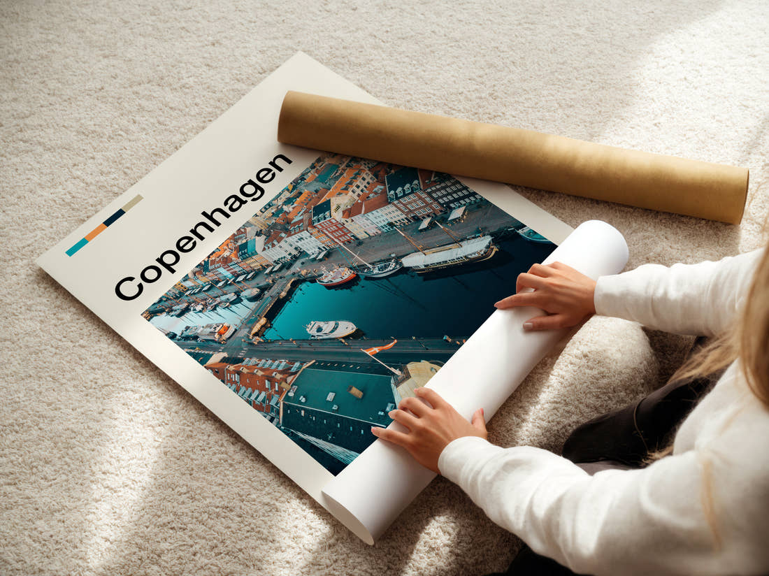 Copenhagen Nyhavn From Above Travel Print being unrolled from its postal tube