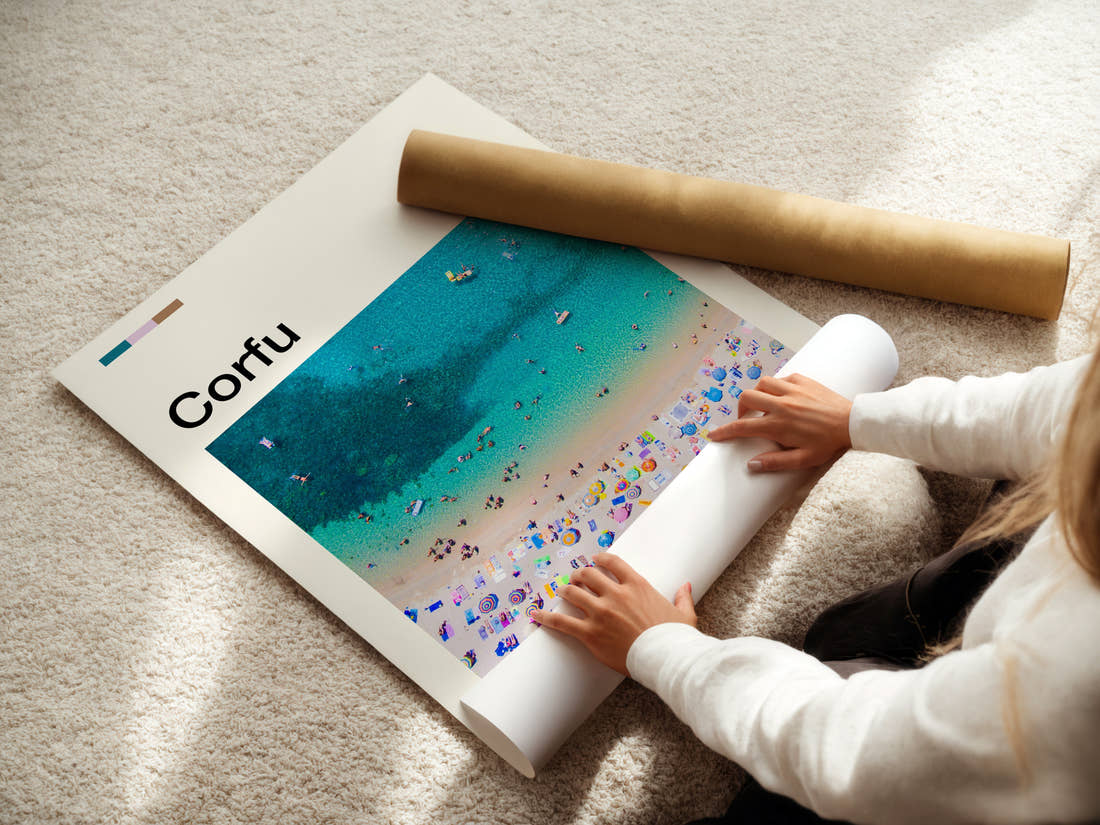 Corfu Aerial Beach View Travel Print being unrolled from its postal tube
