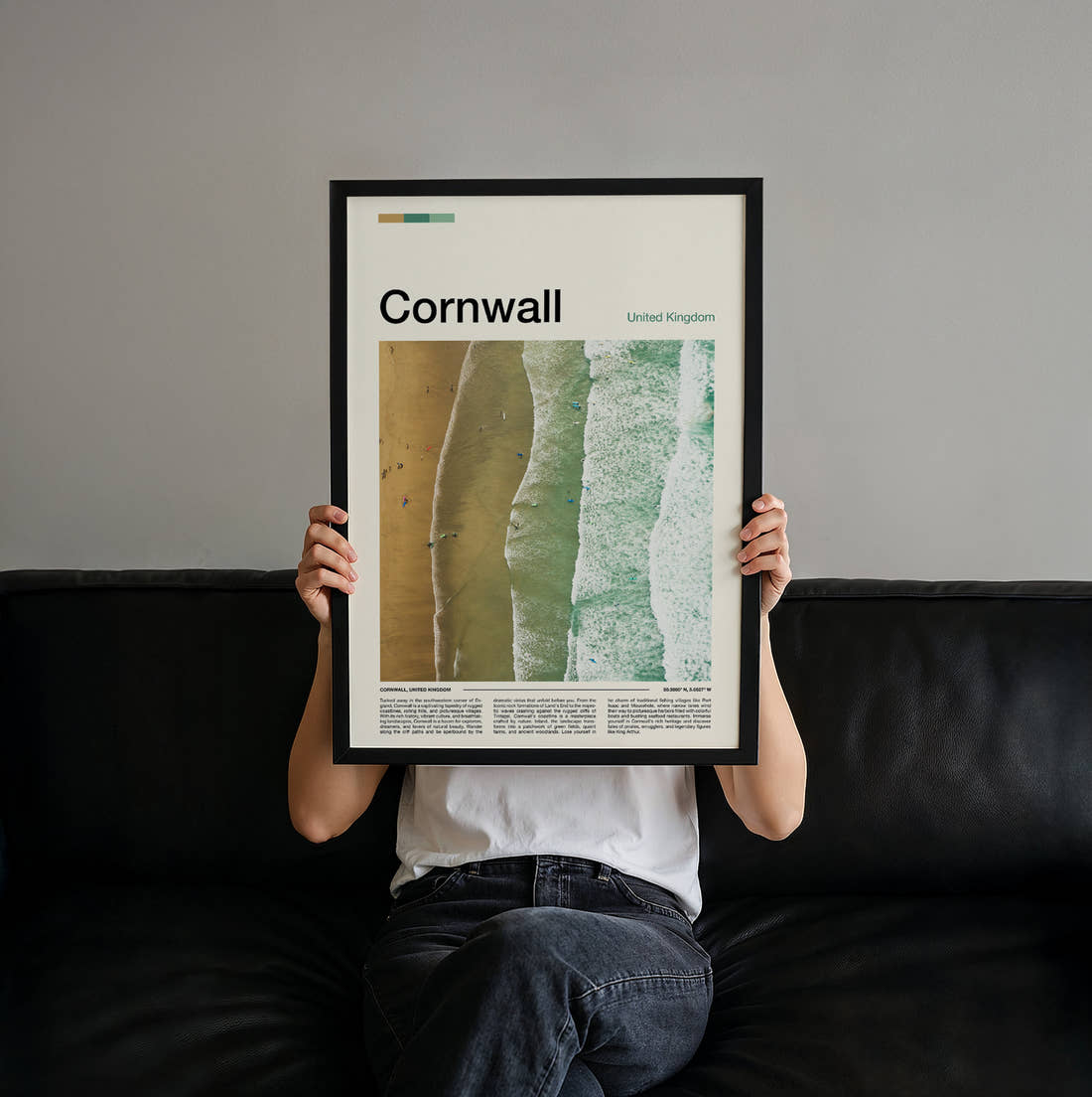 Cornwall Aerial View Of The Beach Travel Print held up by hand to show the size of the print