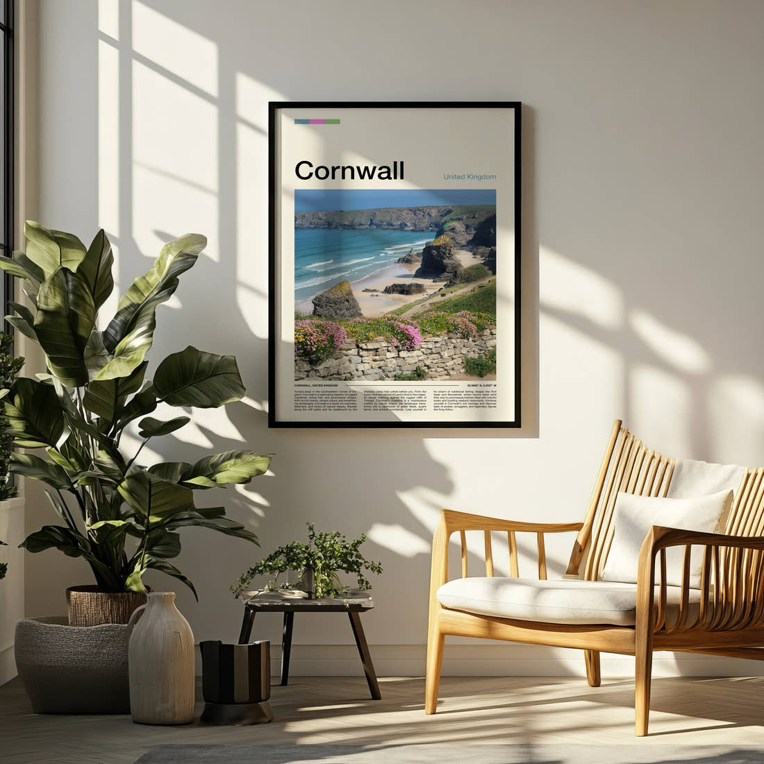 Cornwall Bedruthan Steps Travel Print framed on a pale wall beside houseplants