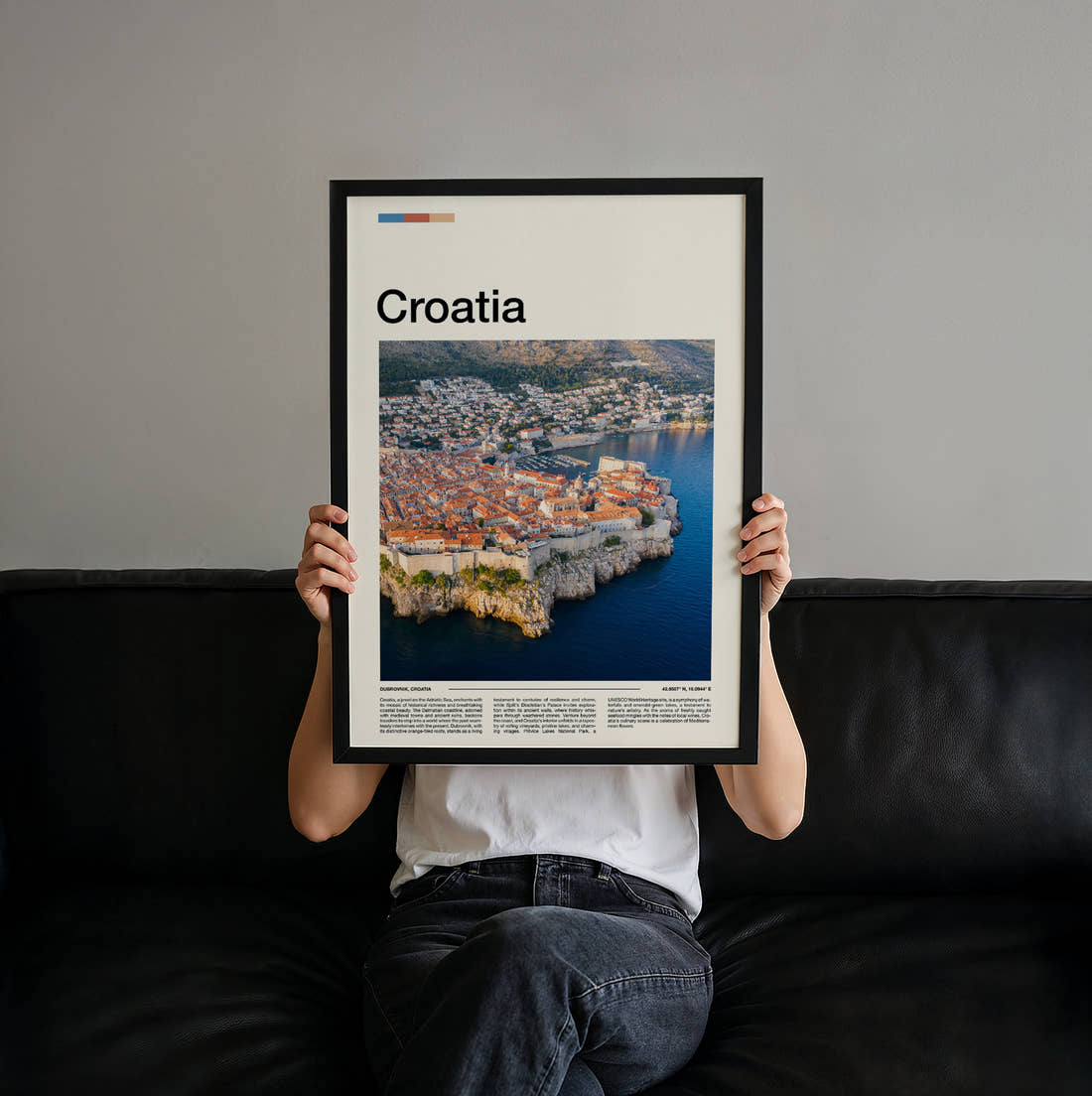 Croatia Old Town Rooftops Travel Print held up by hand to show the size of the print