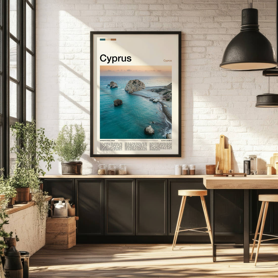 Cyprus Aerial Sea Stacks Travel Print framed on the wall of a bright kitchen and dining space