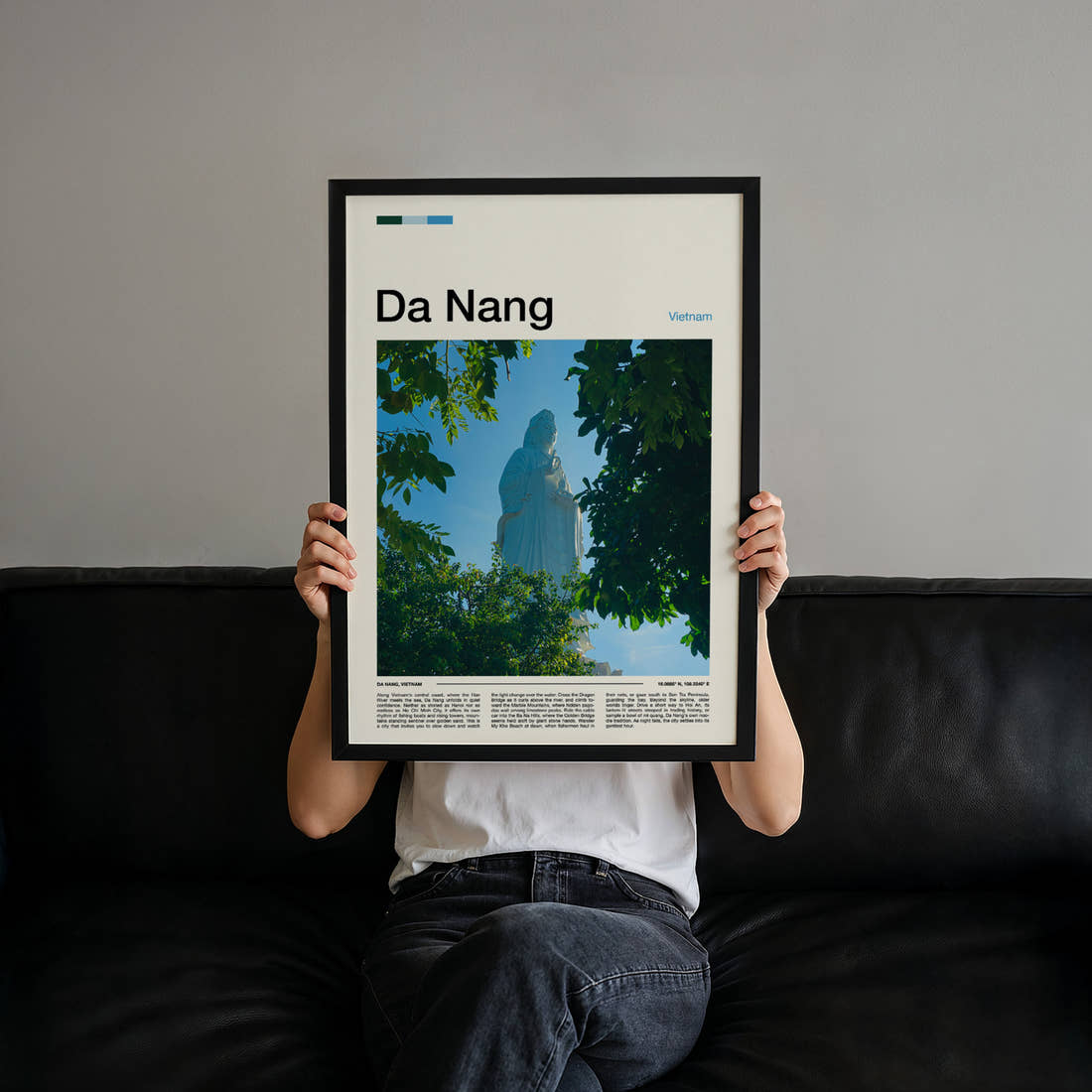 Da Nang Lady Buddha Statue Travel Print held up by hand to show the size of the print