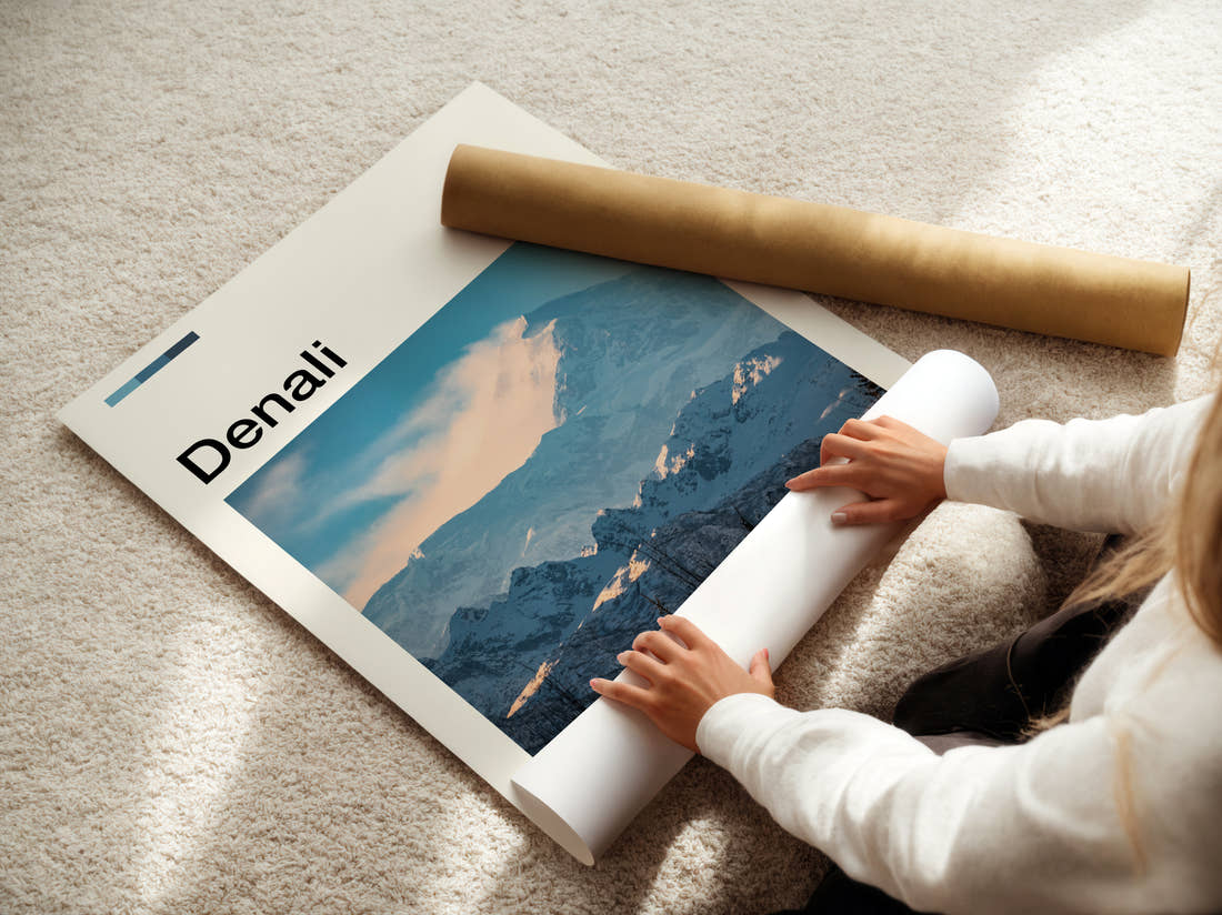 Denali Snowy Mountain Range Travel Print being unrolled from its postal tube
