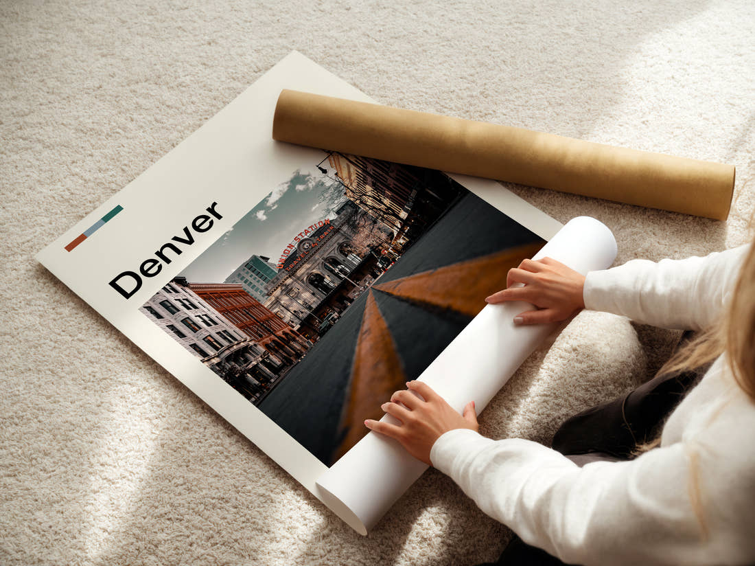 Denver Union Station Travel Print being unrolled from its postal tube