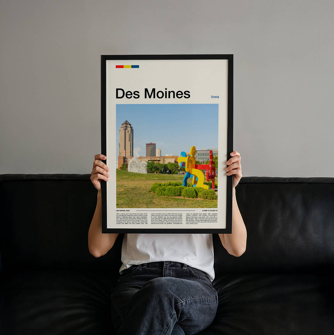 Des Moines Colourful Sculpture Travel Print held up by hand to show the size of the print