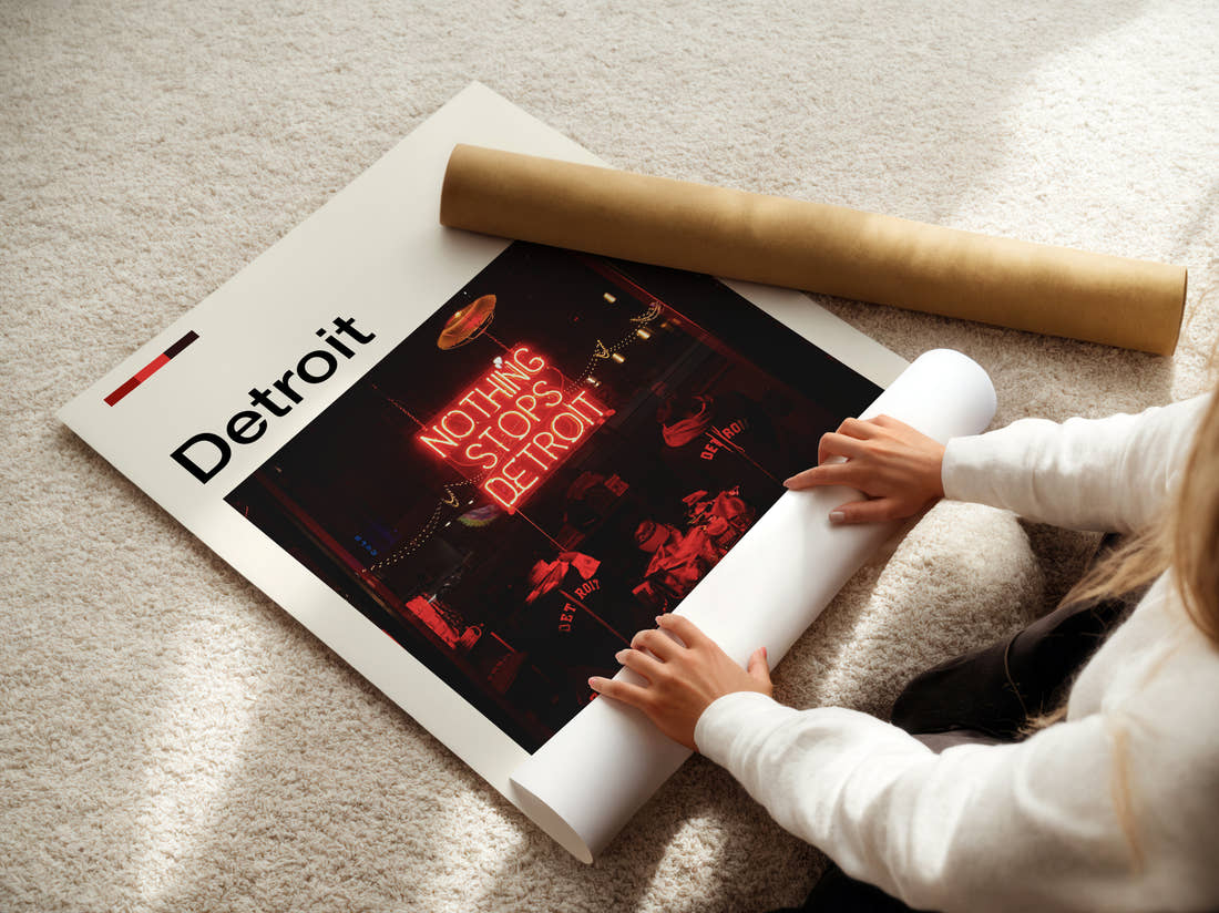Detroit Neon Window Sign Travel Print being unrolled from its postal tube