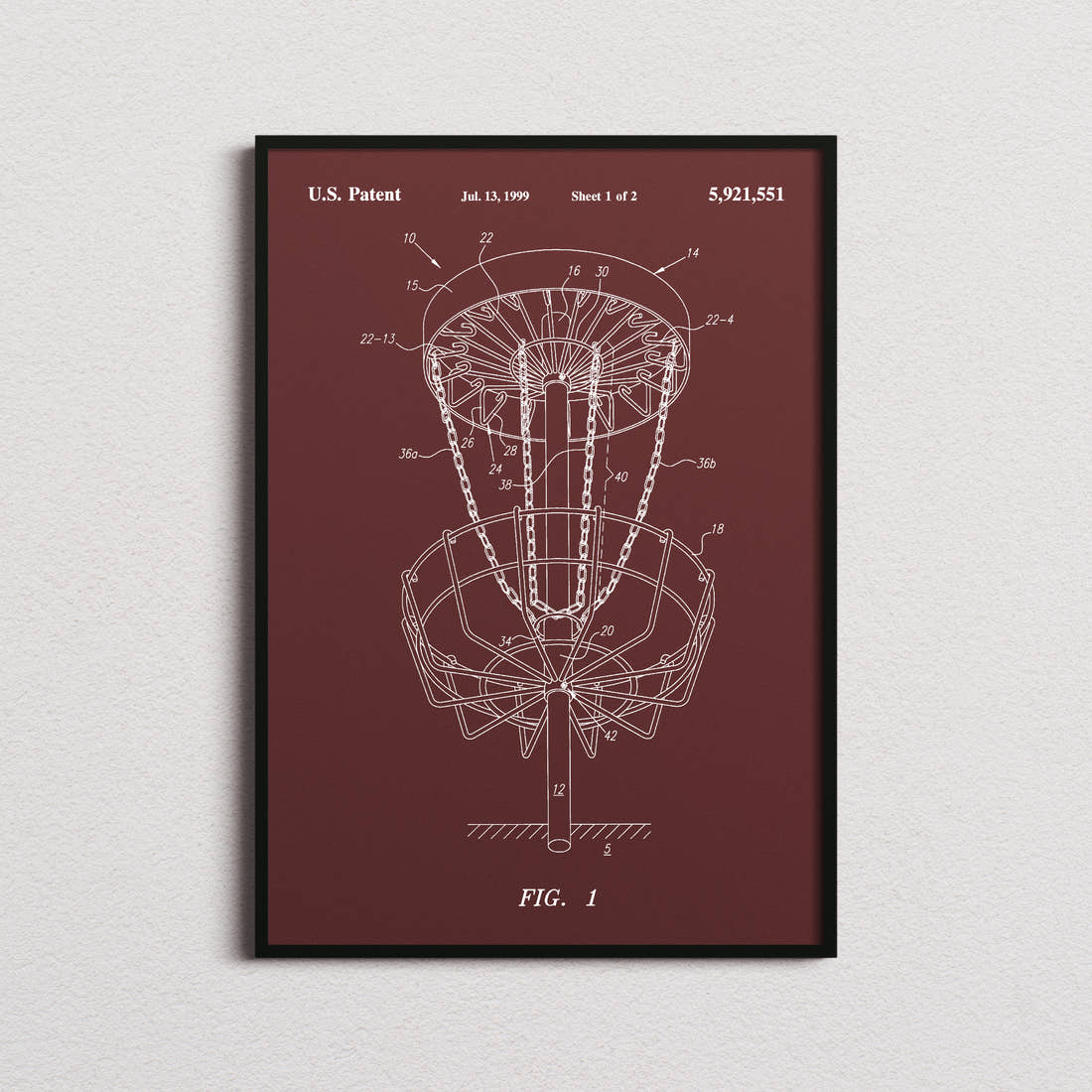 Disc Golf Target Patent Print in the burgundy colourway, framed