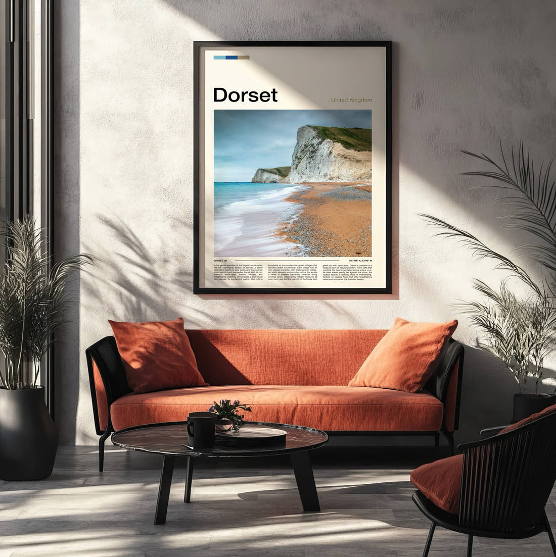 Dorset Chalk Cliffs And Beach Travel Print framed on the wall of a modern living room