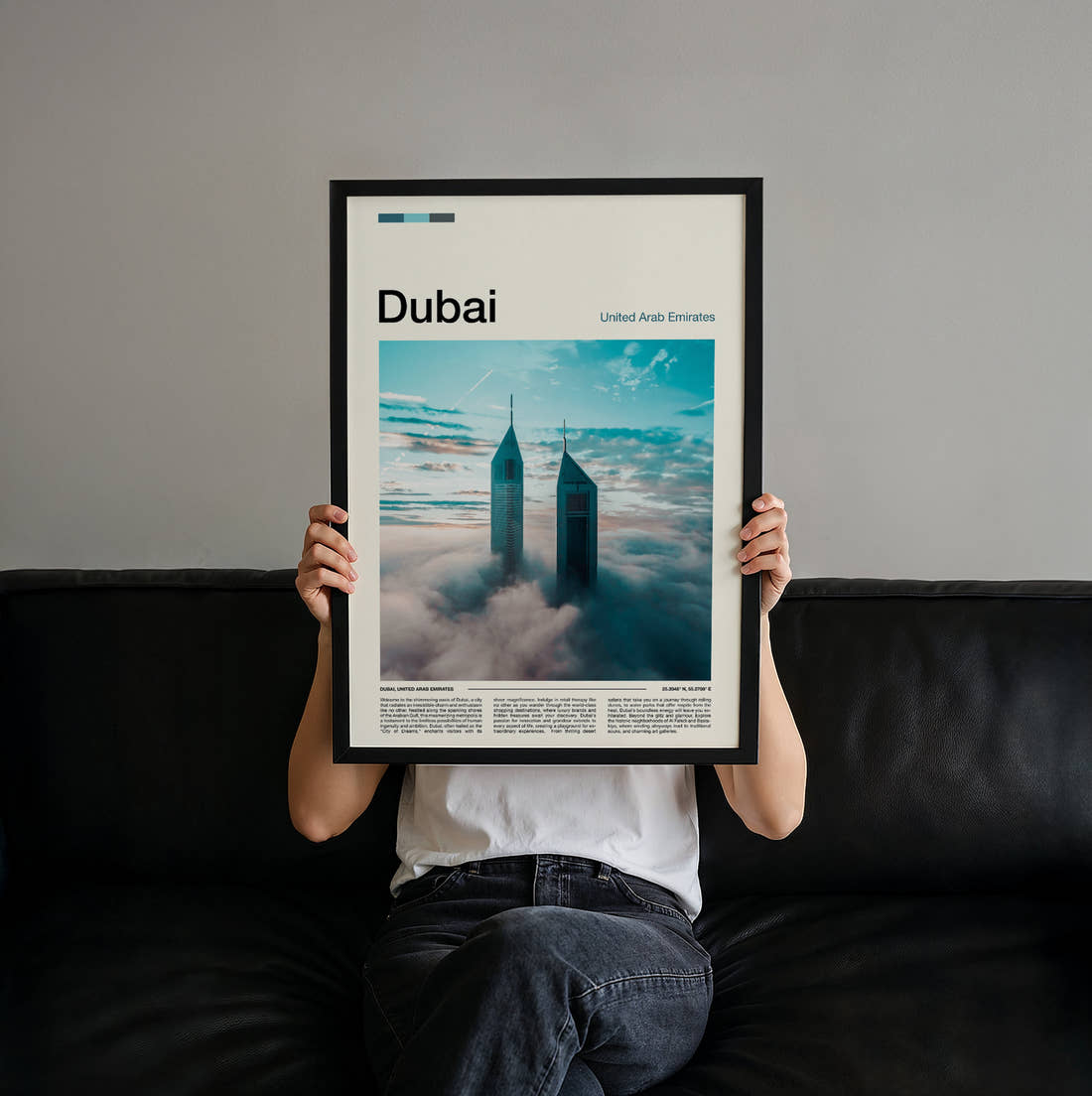 Dubai Towers Above The Clouds Travel Print held up by hand to show the size of the print