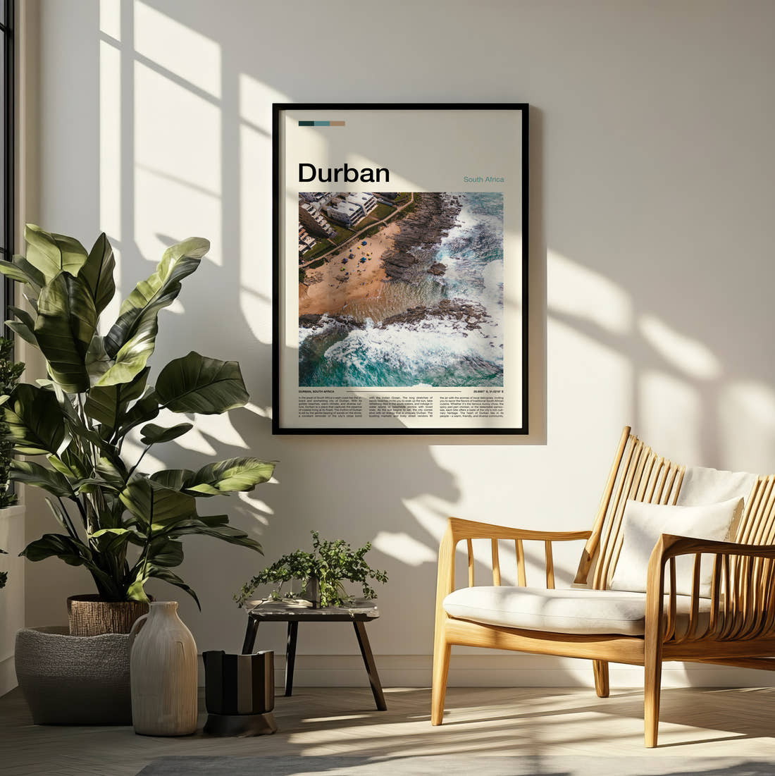 Durban Coastline From Above Travel Print framed on a pale wall beside houseplants