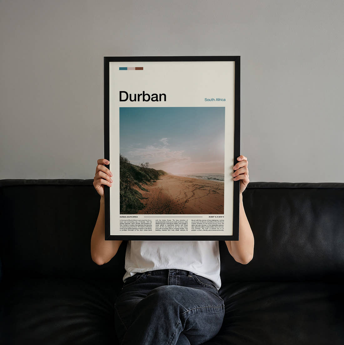 Durban Empty Beach Travel Print held up by hand to show the size of the print