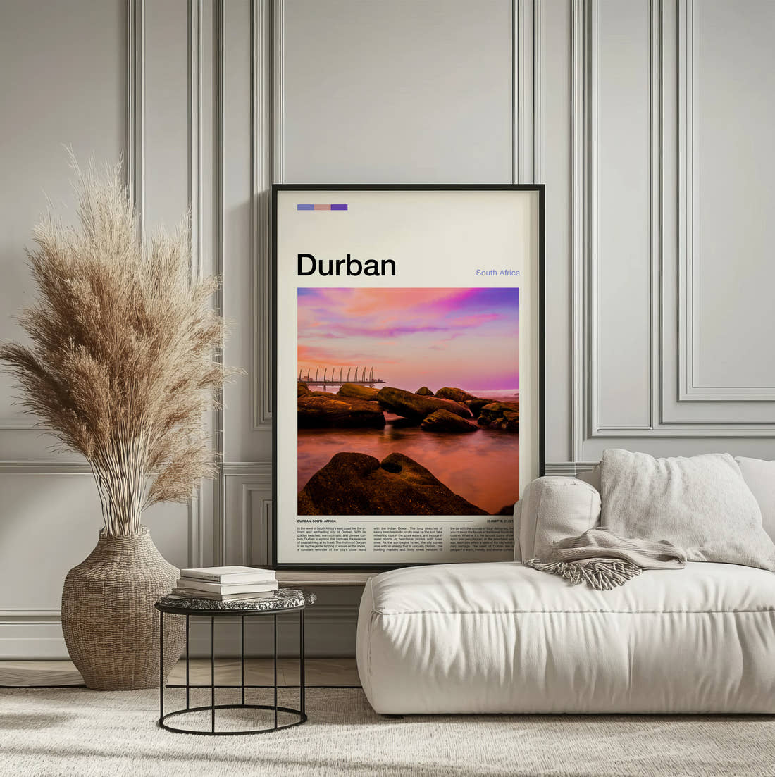Durban Sunset Over The Rocks Travel Print framed on the wall of a calm, neutral bedroom
