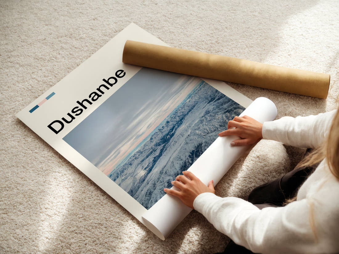 Dushanbe Snowy Mountains Travel Print being unrolled from its postal tube