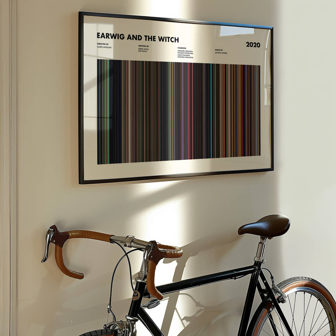 Earwig and the Witch Movie Barcode Poster framed on the wall of a styled room setting