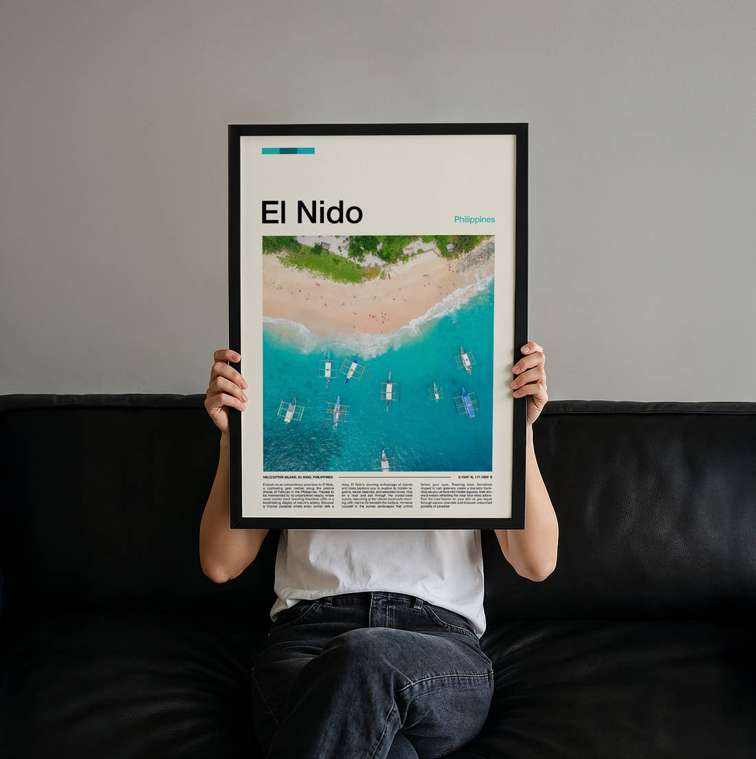 El Nido Boats On Turquoise Water Travel Print held up by hand to show the size of the print