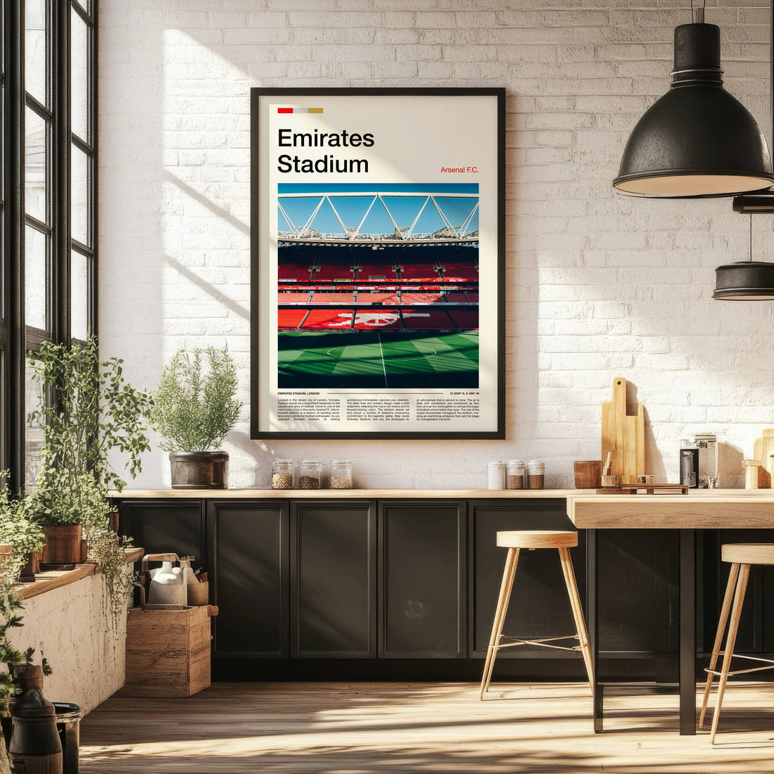 Emirates Stadium Print framed on the wall of a bright kitchen and dining space