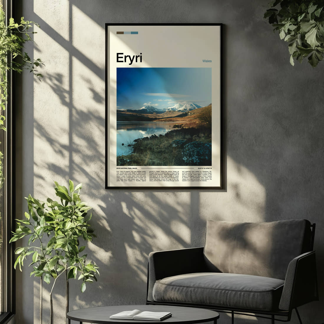 Eryri Snow-Capped Mountain Range Travel Print framed on the wall of a relaxed living room