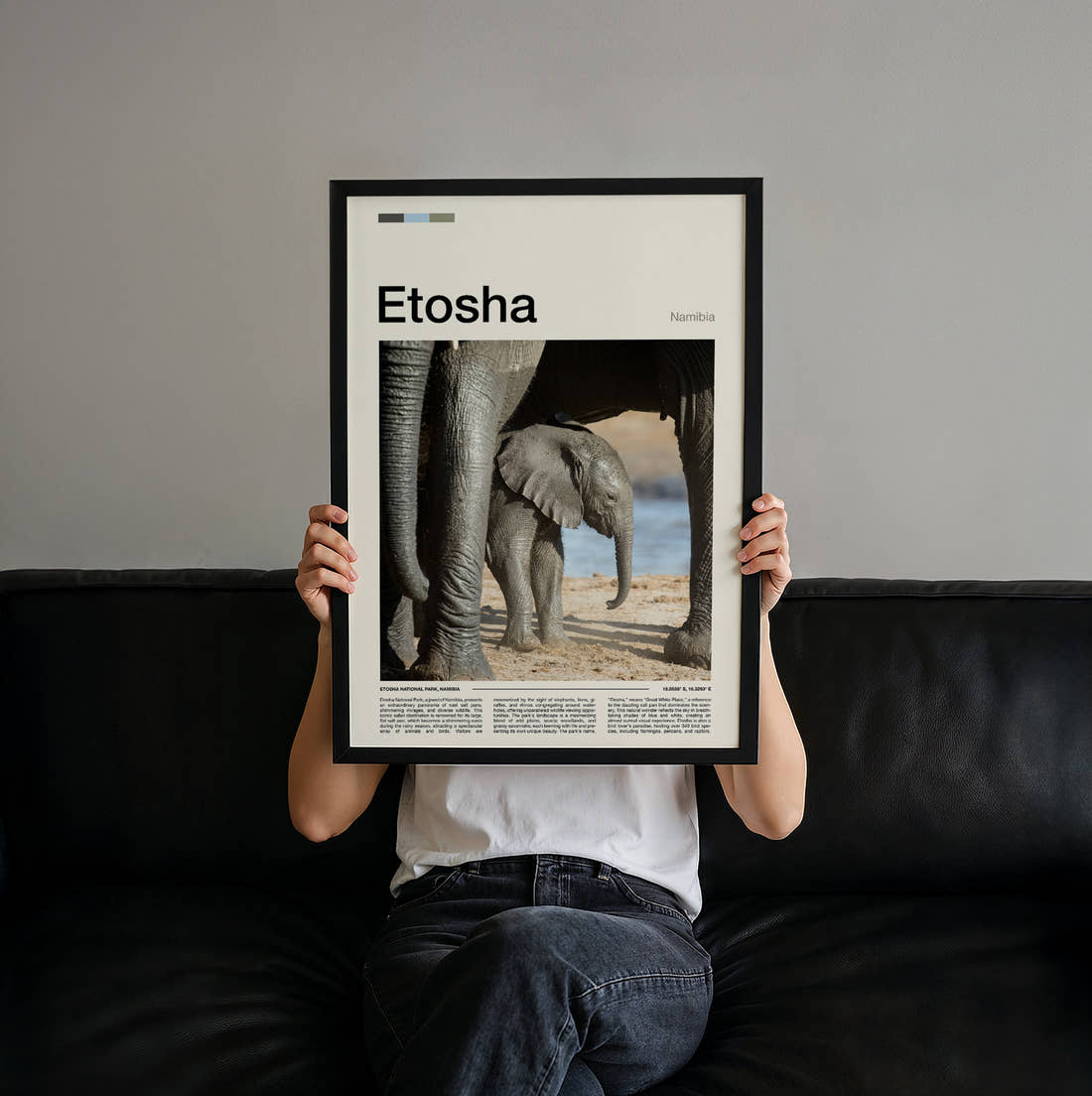 Etosha Baby Elephant Travel Print held up by hand to show the size of the print