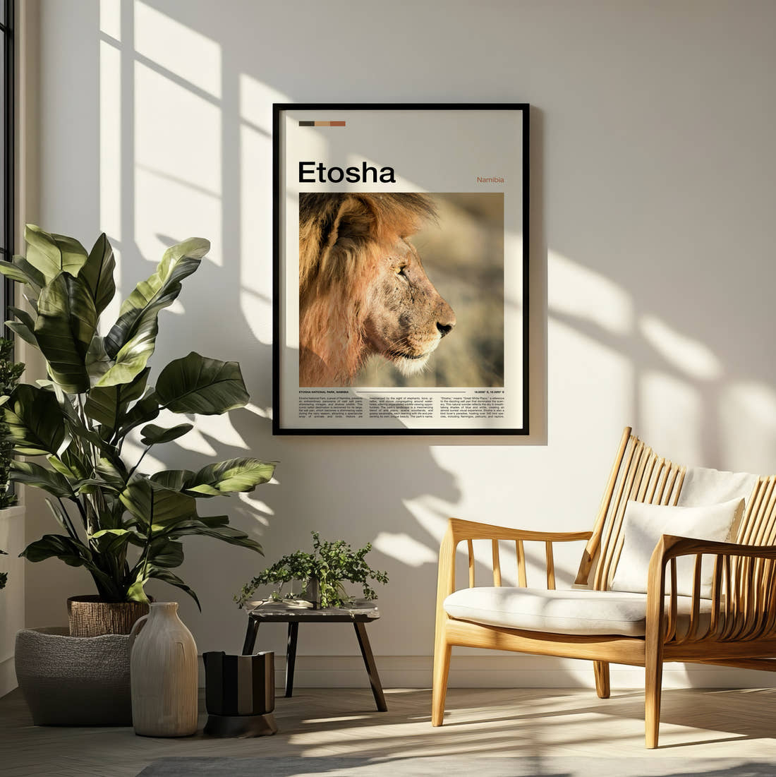 Etosha Lion Portrait Travel Print framed on a pale wall beside houseplants
