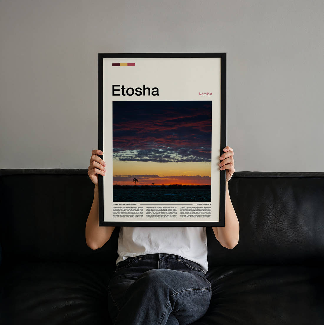 Etosha Dramatic Sunset Sky Travel Print held up by hand to show the size of the print
