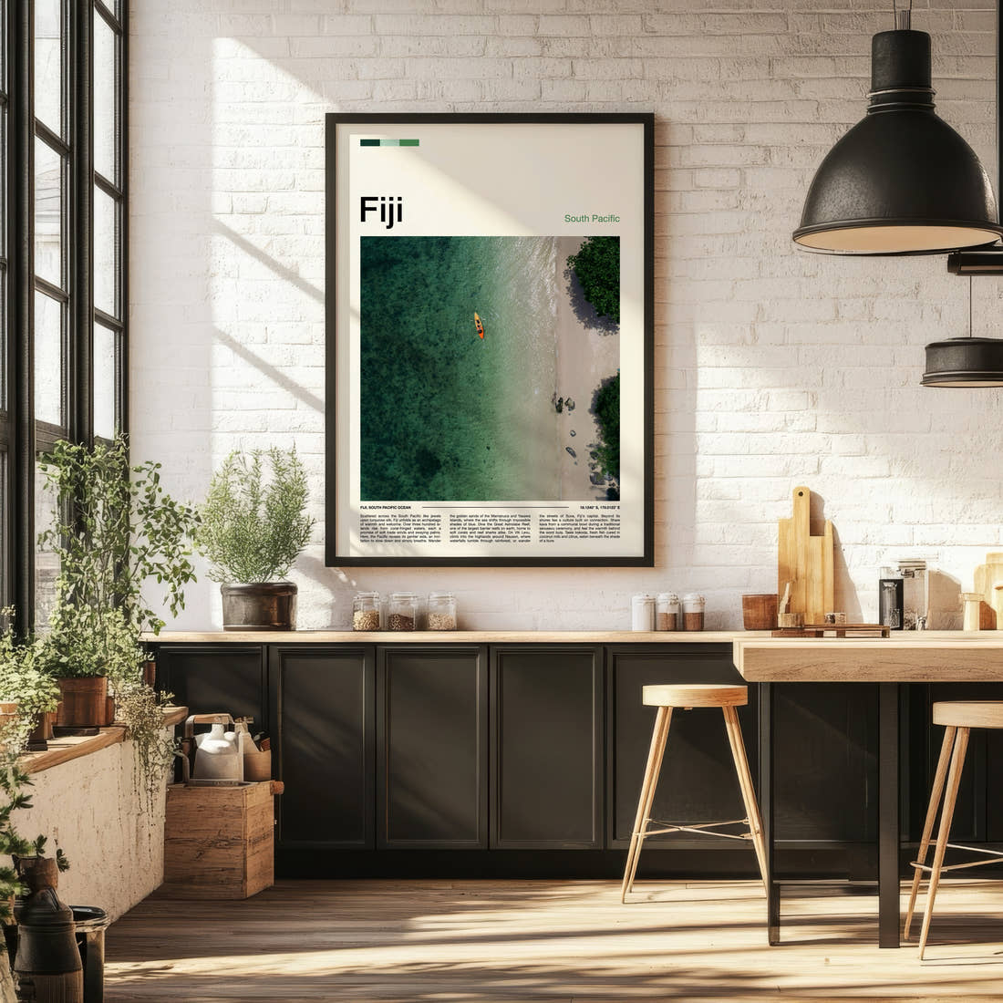Fiji Turquoise Lagoon From Above Travel Print framed on the wall of a bright kitchen and dining space