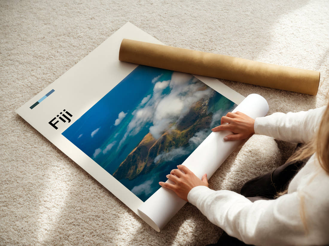 Fiji Cloud-Wreathed Island Travel Print being unrolled from its postal tube