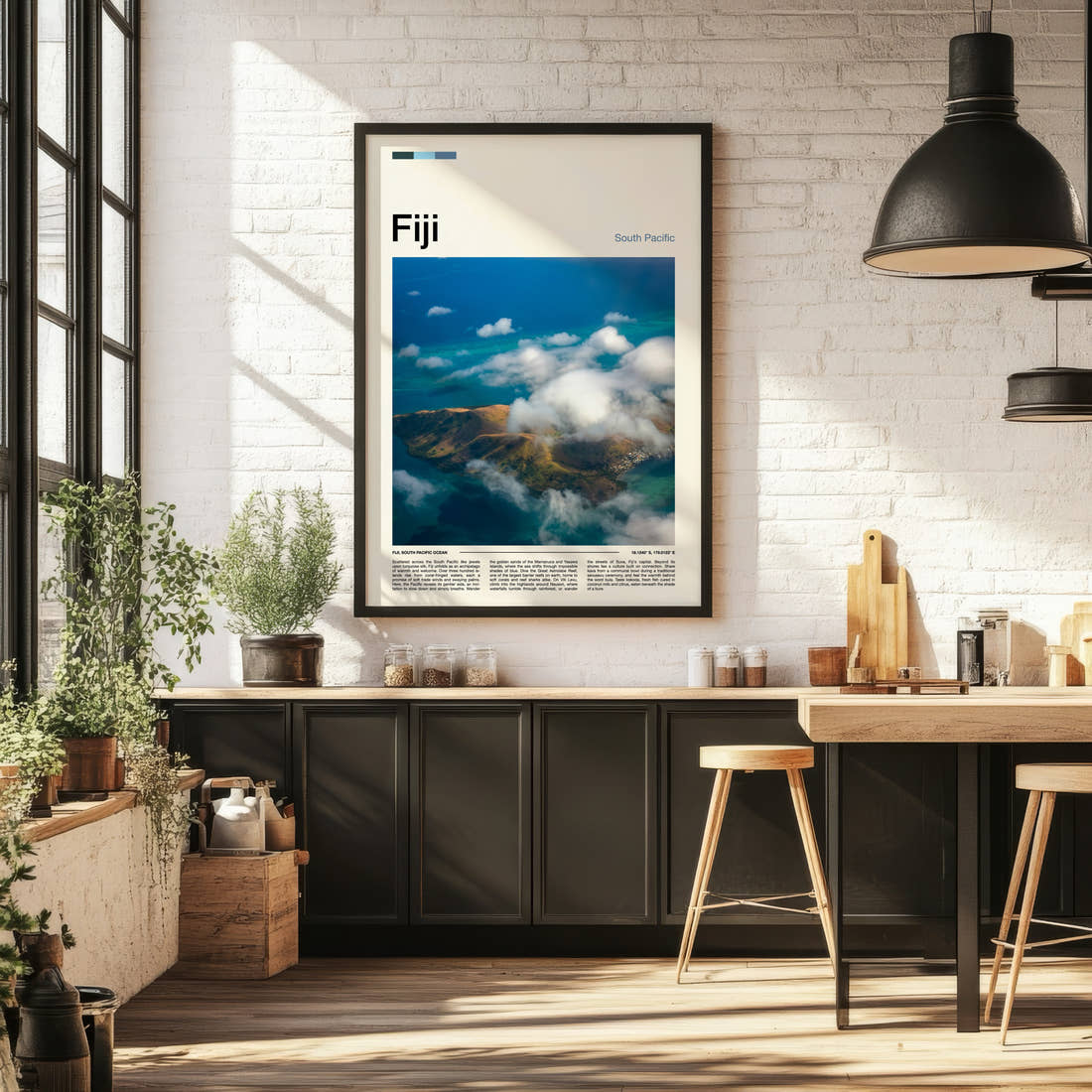 Fiji Cloud-Wreathed Island Travel Print framed on the wall of a bright kitchen and dining space
