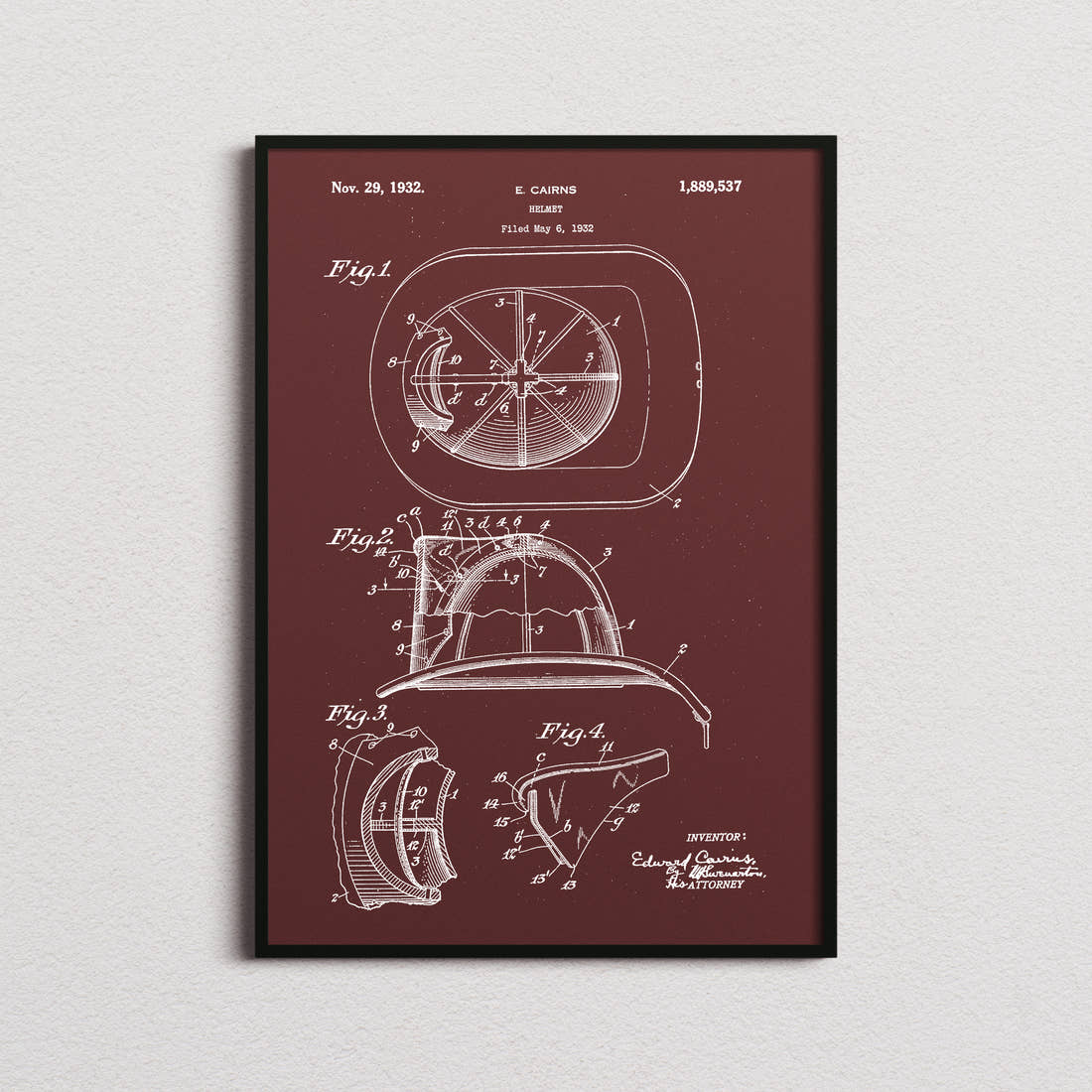 Fire Helmet Patent Print in the burgundy colourway, framed
