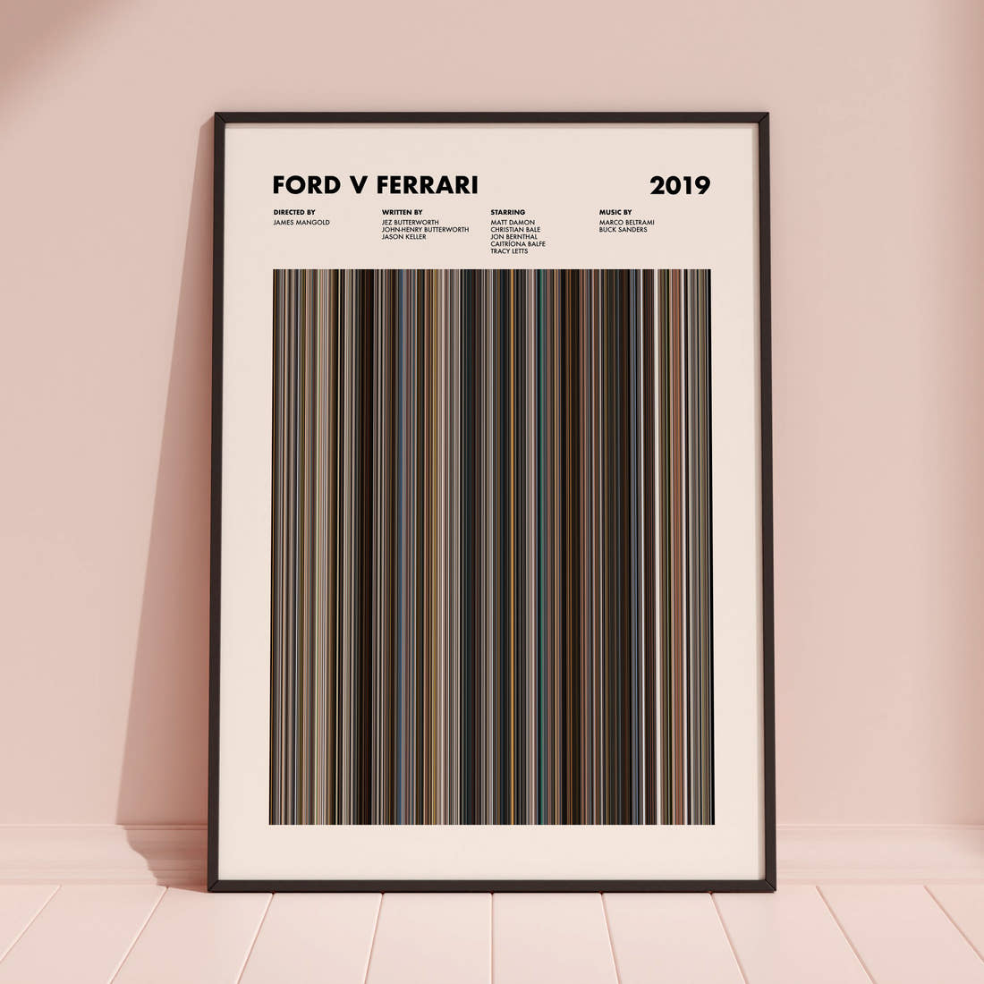 Ford v Ferrari Movie Barcode Poster framed and leaning against a coloured wall