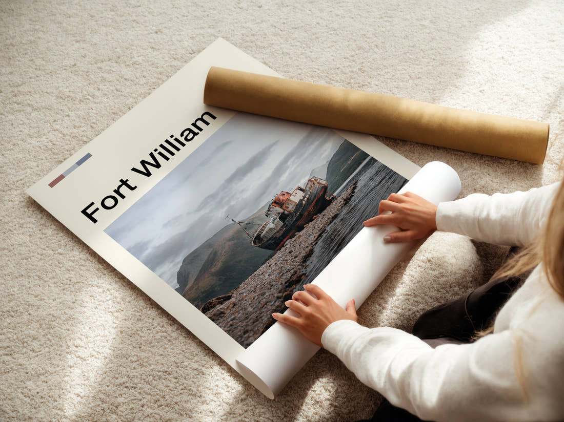 Fort William Shipwreck On The Shore Travel Print being unrolled from its postal tube