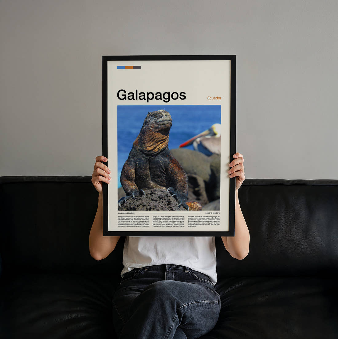 Galapagos Marine Iguana Travel Print held up by hand to show the size of the print