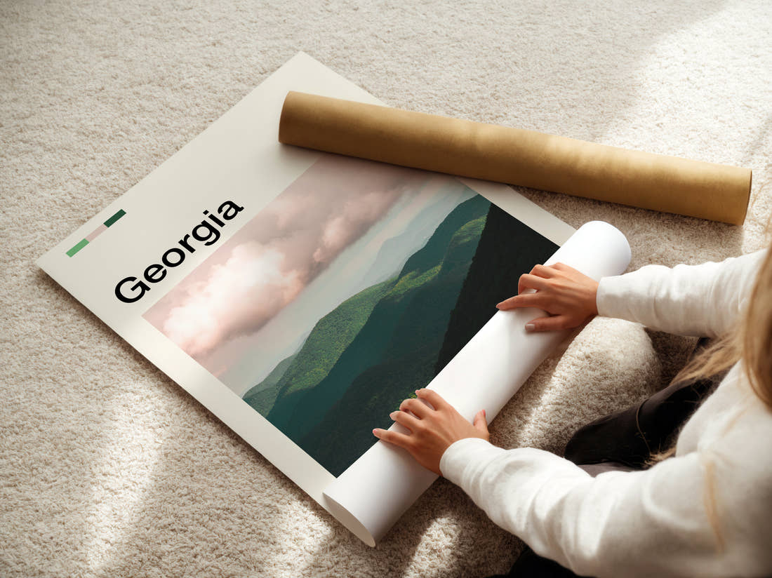 Georgia Misty Green Mountains Travel Print being unrolled from its postal tube