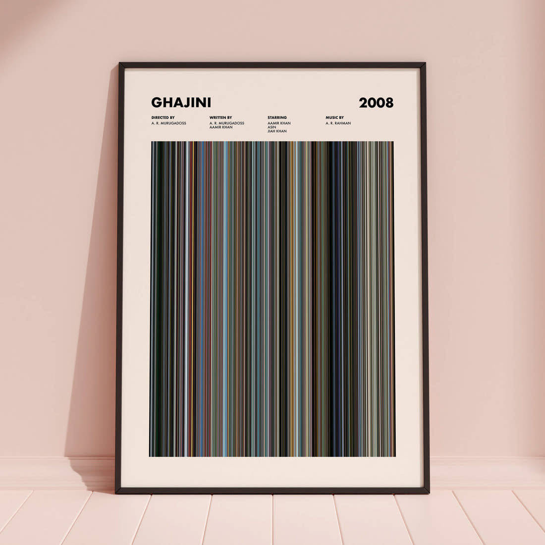 Ghajini Movie Barcode Poster framed and leaning against a coloured wall
