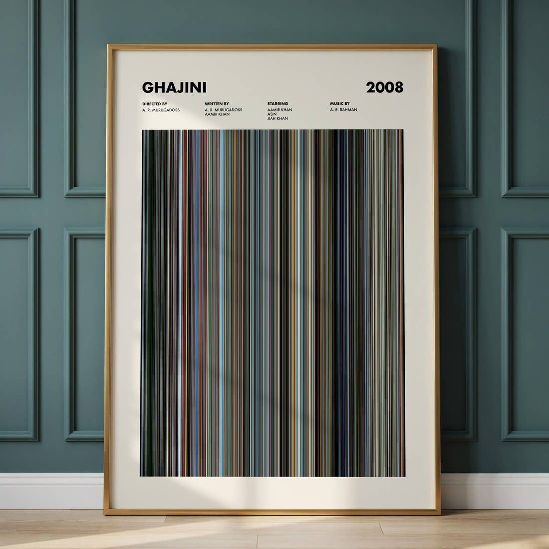 Ghajini Movie Barcode Poster framed and leaning against a panelled wall