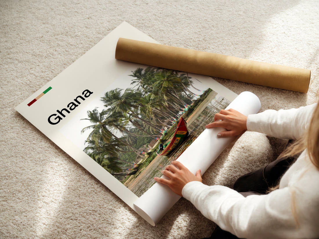 Ghana Wooden Boat And Palm Trees Travel Print being unrolled from its postal tube
