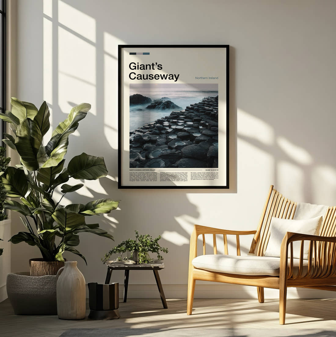 Giant's Causeway Basalt Columns Travel Print framed on a pale wall beside houseplants