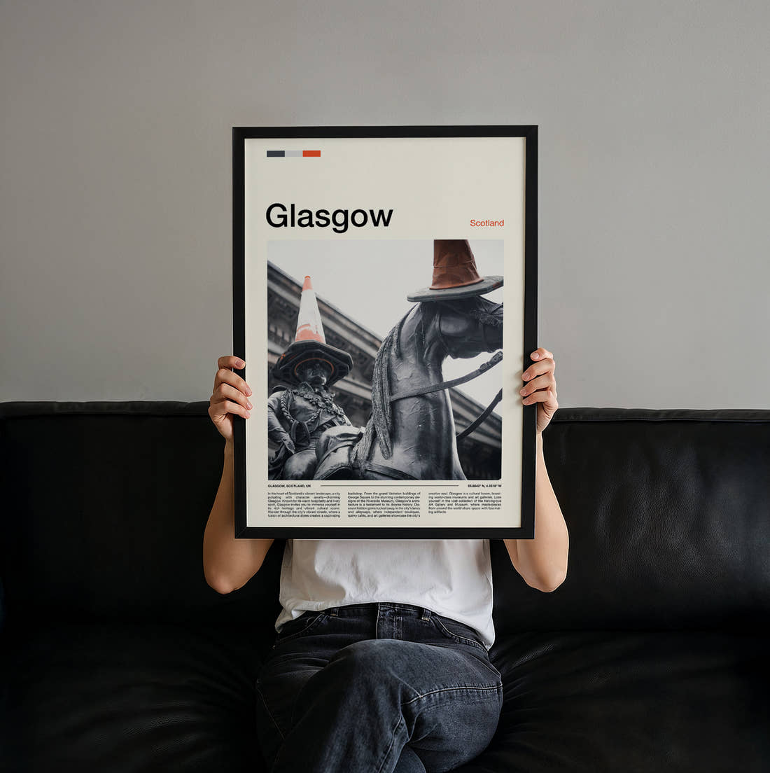 Glasgow Statue With Traffic Cone Travel Print held up by hand to show the size of the print
