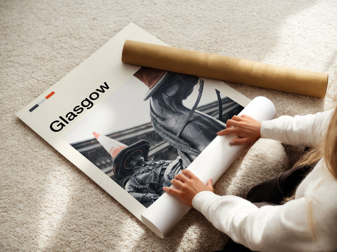 Glasgow Statue With Traffic Cone Travel Print being unrolled from its postal tube
