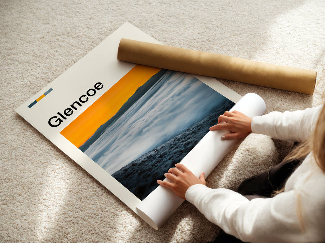 Glencoe Above The Clouds Travel Print being unrolled from its postal tube